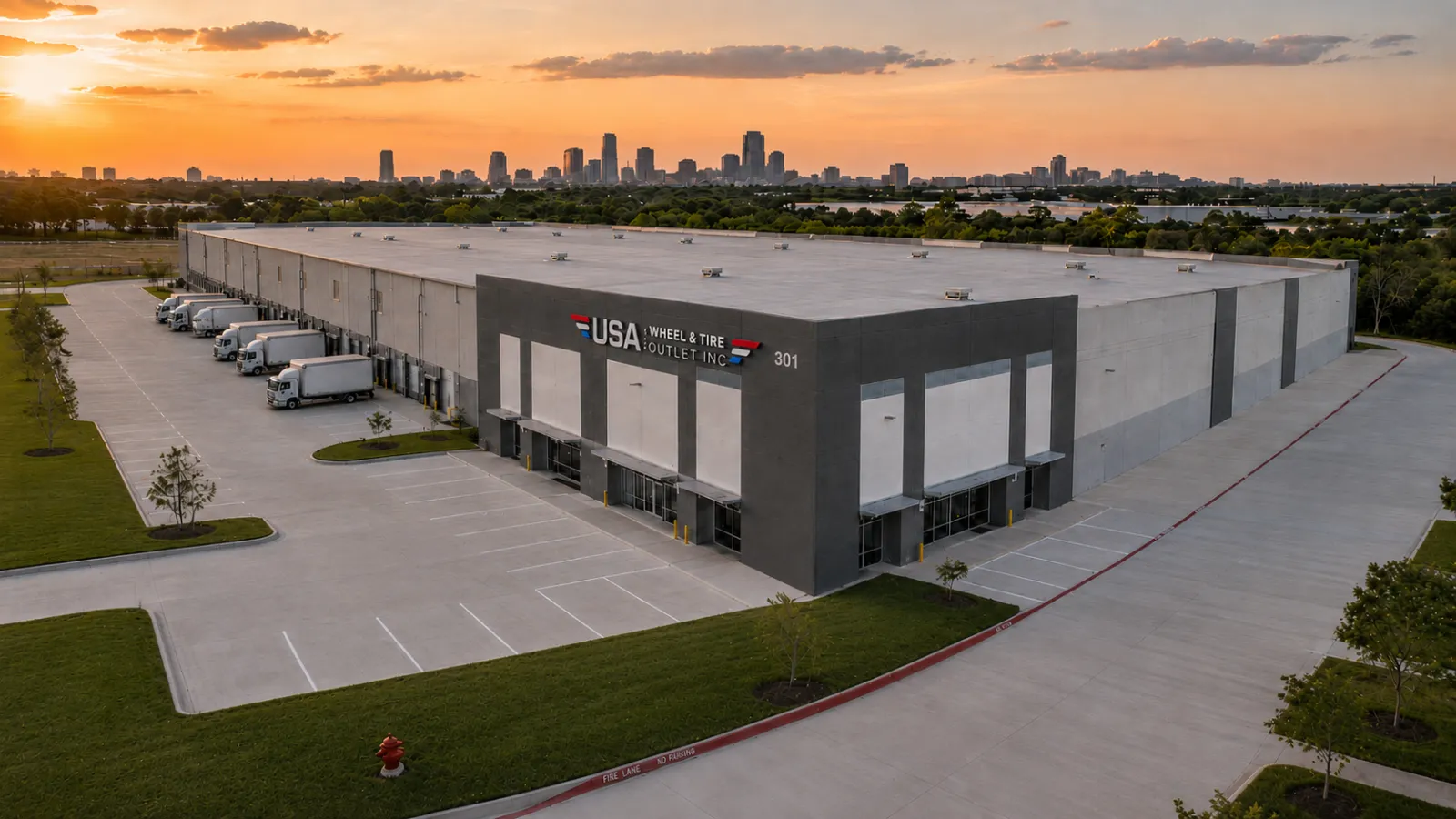 USA Wheels & Tires distribution facility at sunset
